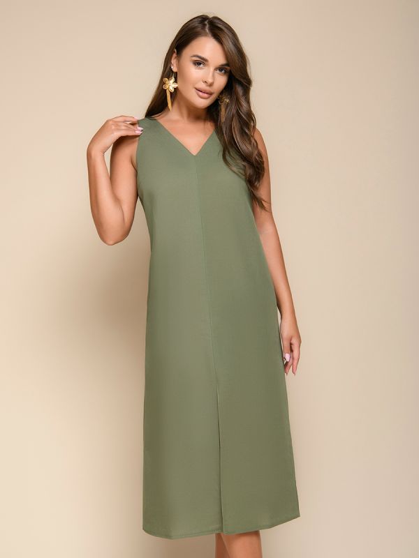 Green dress with sleeveless V-neck and slit