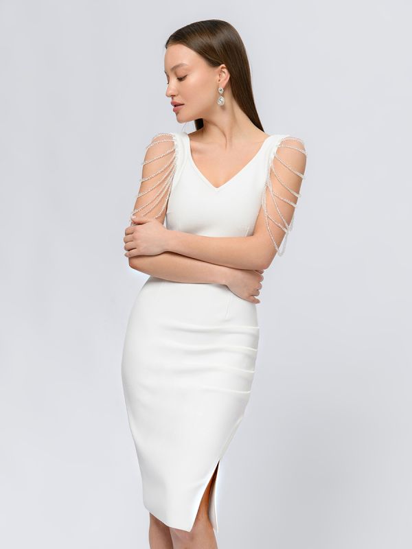 Mini length white bandage dress with decorative embellishment