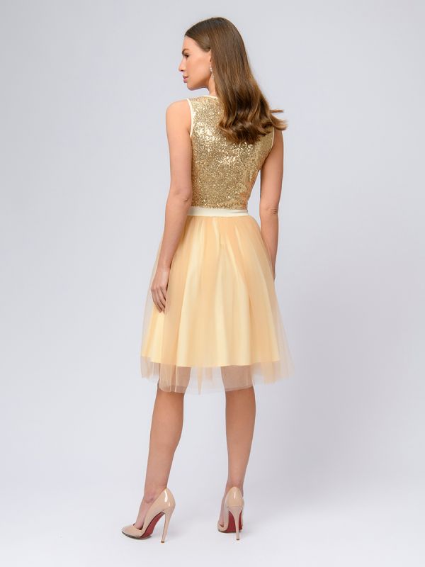 Gold colored midi length dress with sequins and tulle skirt