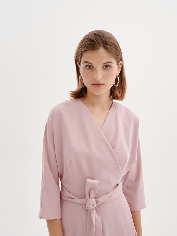 Pink midi length dress with flap and 3/4 sleeves