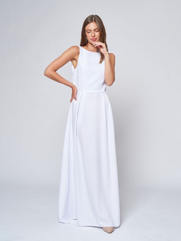 Sleeveless white maxi length dress with lace inset on back