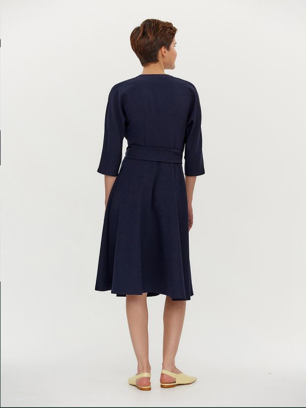 Dark blue midi length dress with flap and 3/4 sleeves