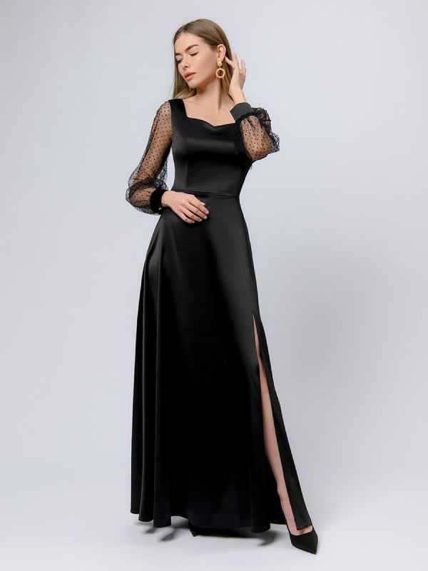 Black maxi length dress with slit skirt and tulle sleeves