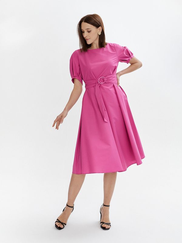 Fuchsia colored midi length dress with voluminous sleeves and a belt