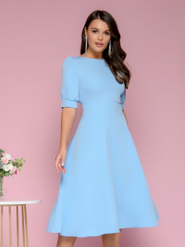 Blue midi length dress with shaped cutout on the back