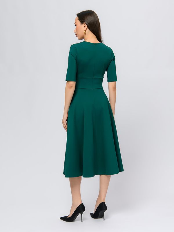 Emerald-colored midi dress with deep neckline and 1/2 sleeves