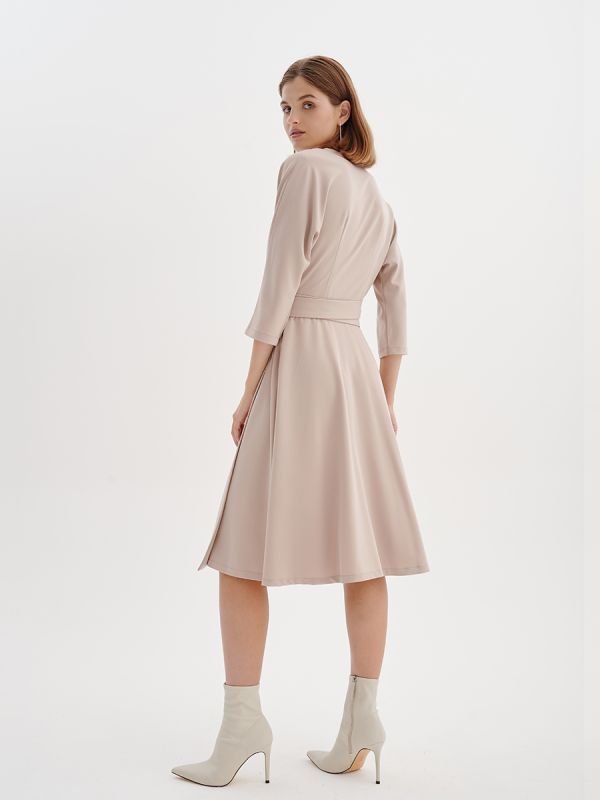 Beige midi length dress with stocking and 3/4 sleeves