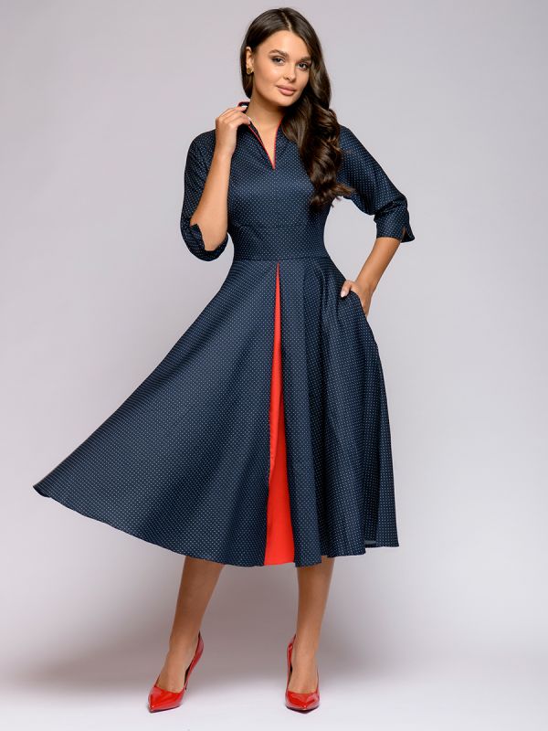 Midi length navy blue polka dot dress with red inset