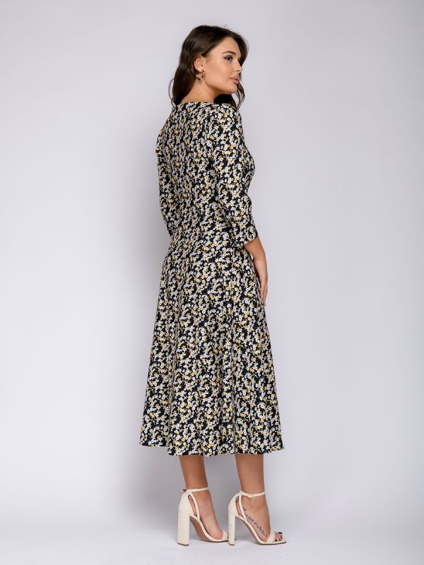 Black midi length dress with floral print and bob neckline