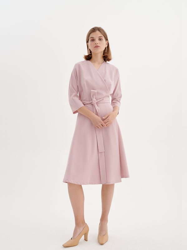 Pink midi length dress with flap and 3/4 sleeves