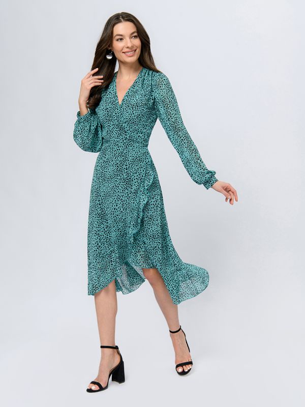 Turquoise colored midi length dress with print