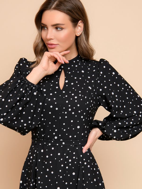 Black polka dot midi dress with voluminous sleeves and slit