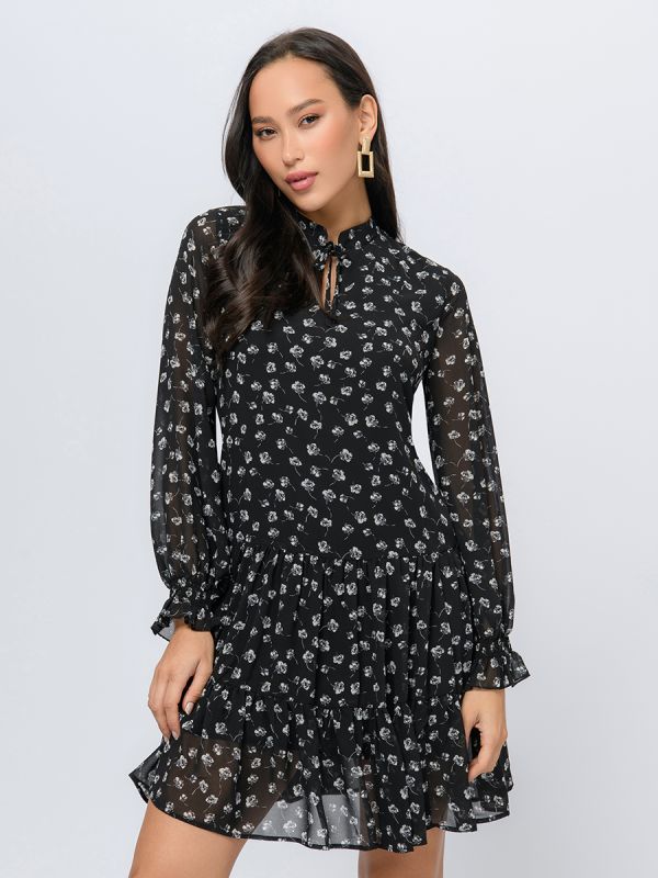 Black mini length dress with floral print and shaped neckline