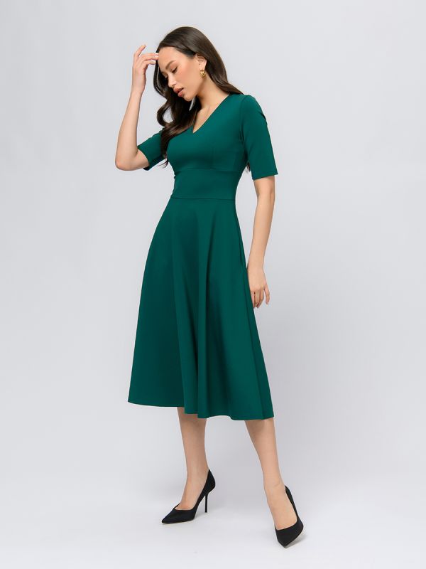 Emerald-colored midi dress with deep neckline and 1/2 sleeves