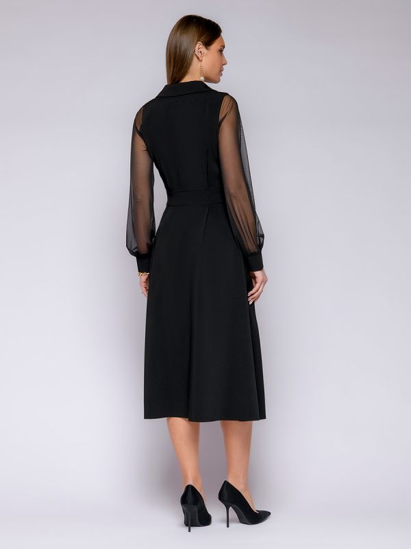 Black midi length dress with decorative belt and tulle sleeves