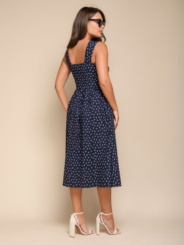 Dark blue midi length dress with strappy print