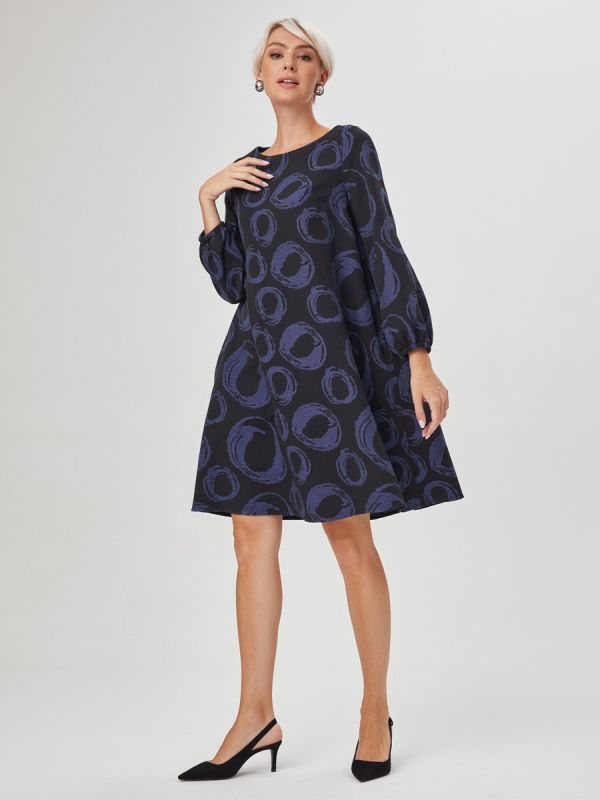 Mini length black print dress with lantern sleeves