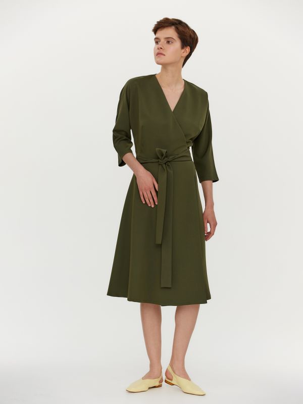 Midi length khaki colored dress with flap and 3/4 sleeves