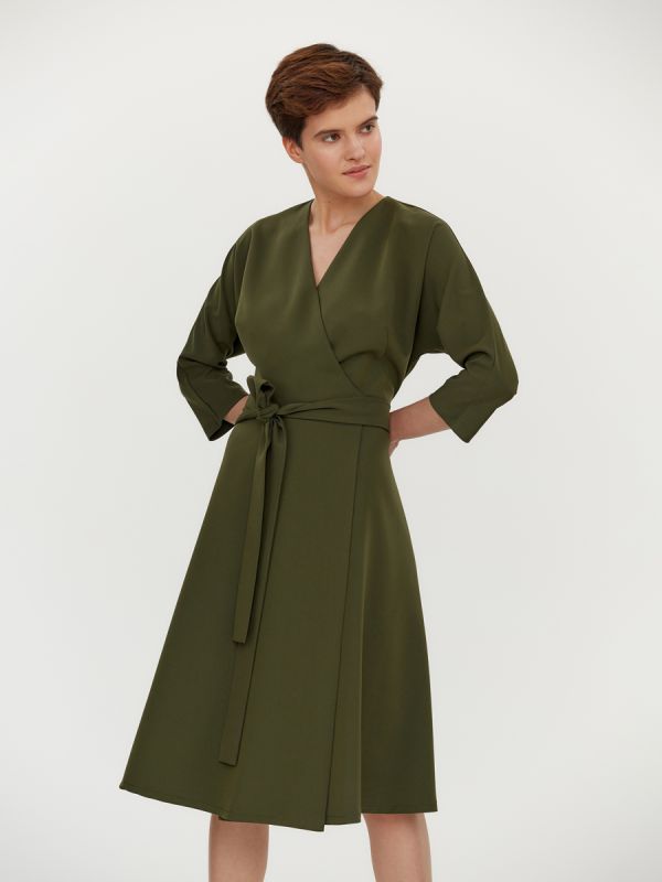 Midi length khaki colored dress with flap and 3/4 sleeves