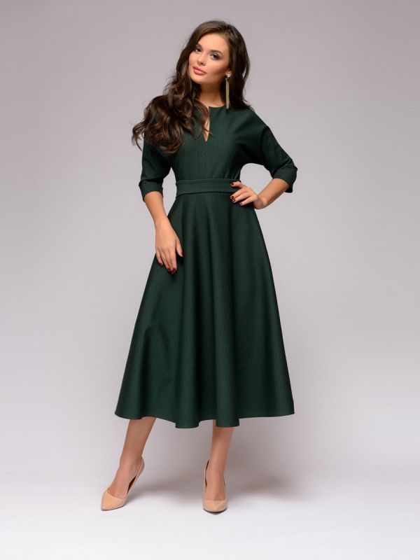 Emerald-colored midi length dress with batwing sleeves