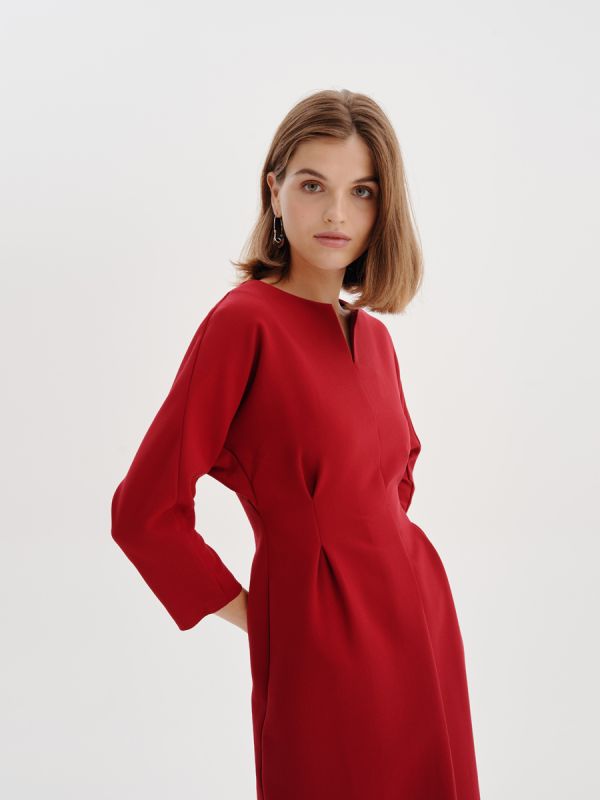 Burgundy dress with pleats at waist and batwing sleeves