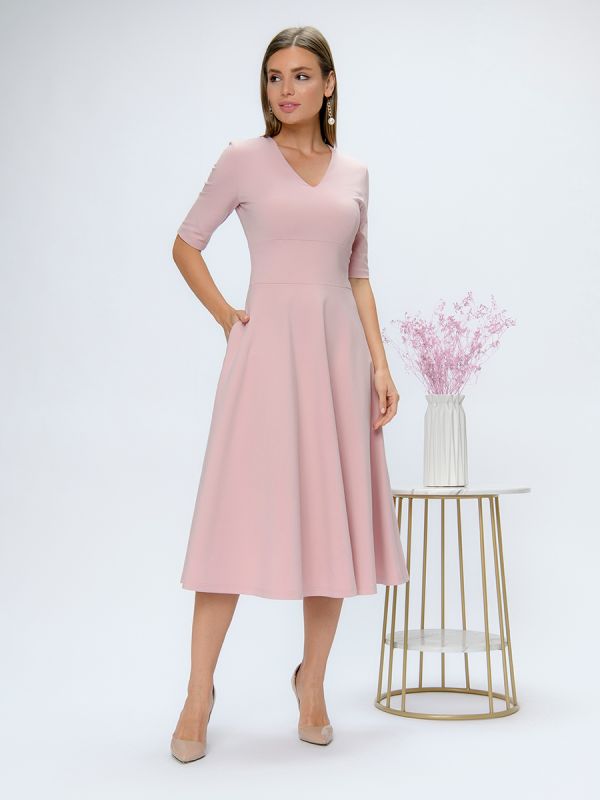 Pink midi length dress with deep neckline and 1/2 sleeves