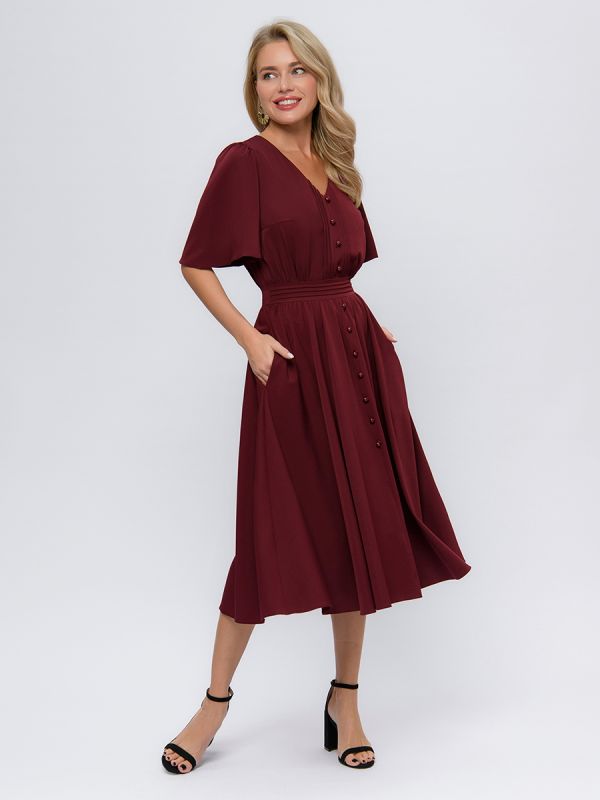 Plum colored midi length dress with V-neckline