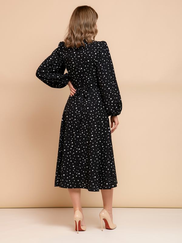 Black polka dot midi dress with voluminous sleeves and slit