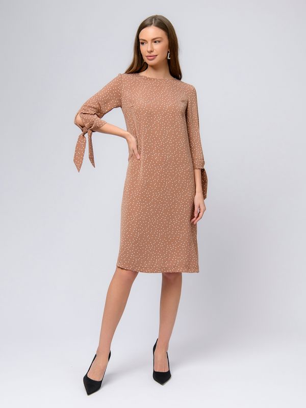 Mocha color polka dot mini dress with ties on the sleeves