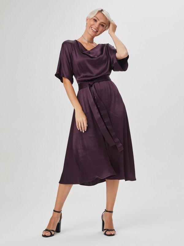 Dark purple midi length dress with short sleeves and belted waist