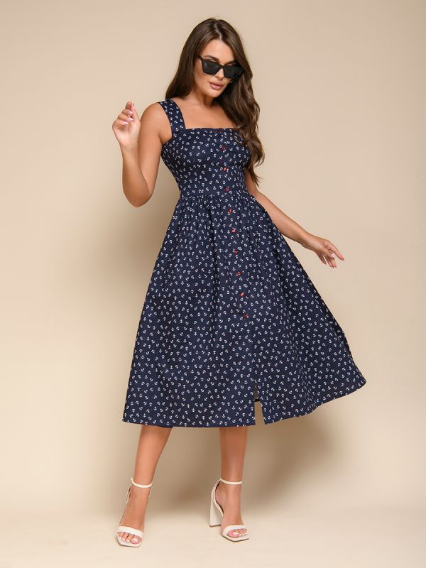 Dark blue midi length dress with strappy print