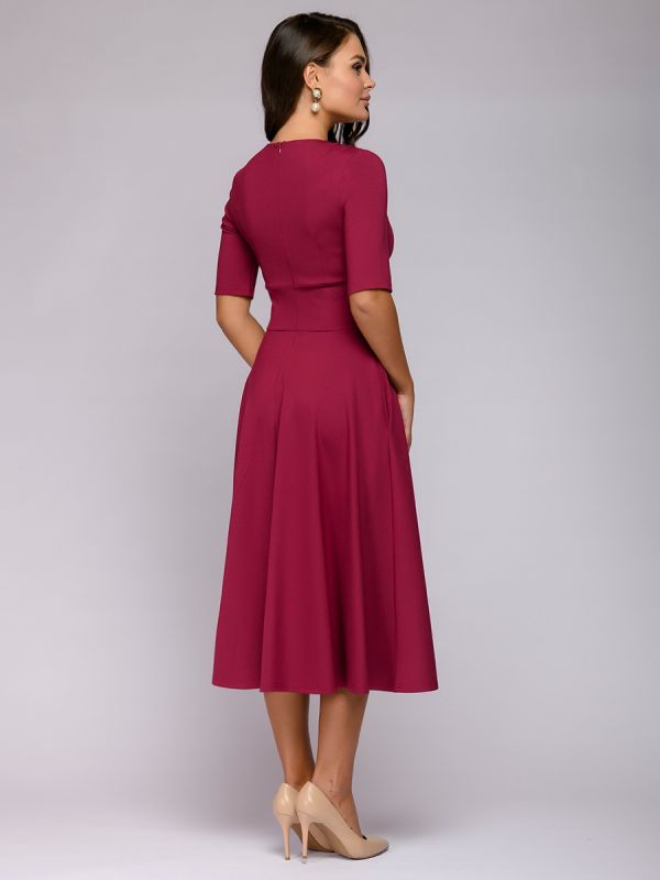 Midi length burgundy dress with deep neckline and 1/2 sleeves