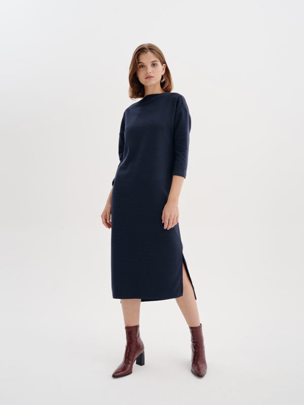 Dark blue midi length dress with 3/4 sleeves and side slits