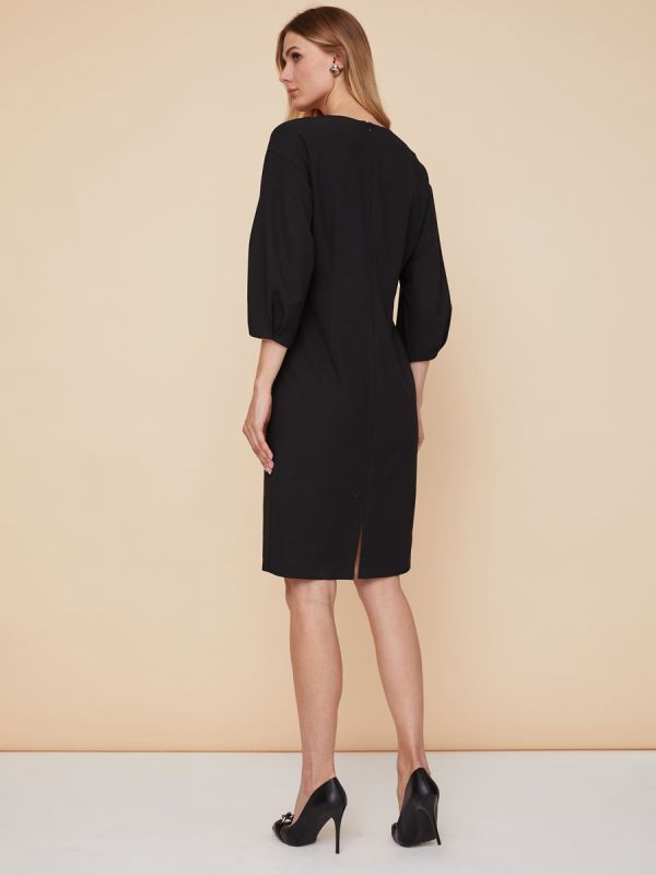 Black mini length dress with voluminous sleeves and pockets