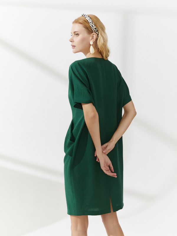 Dark green mini length dress with short sleeves and pockets