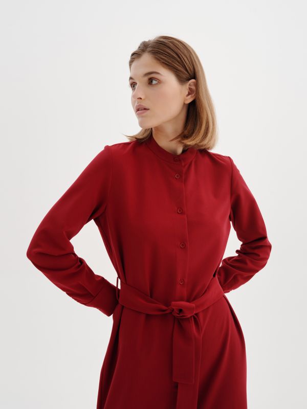 Midi length burgundy dress with slits on the sides and belt