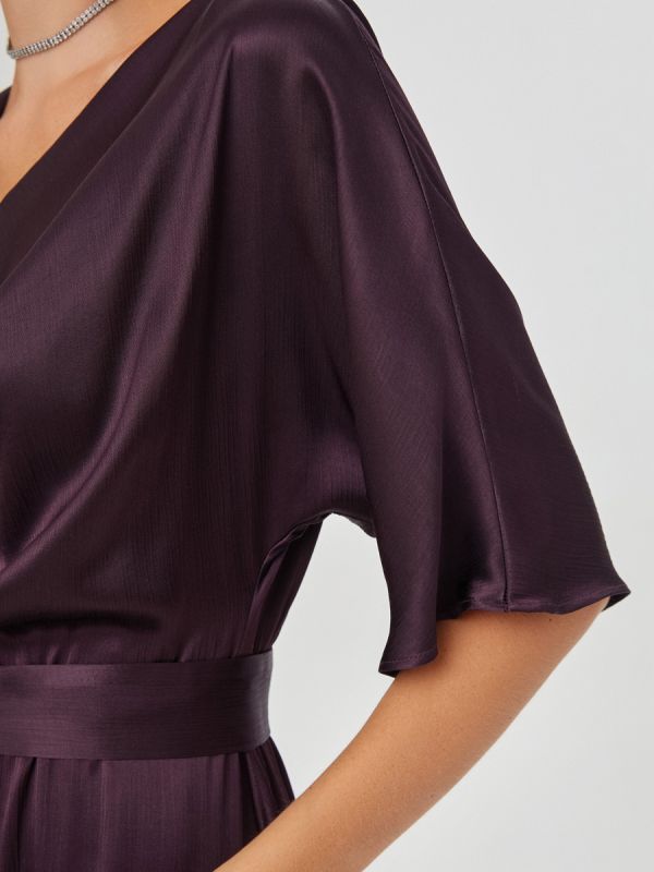 Dark purple midi length dress with short sleeves and belted waist