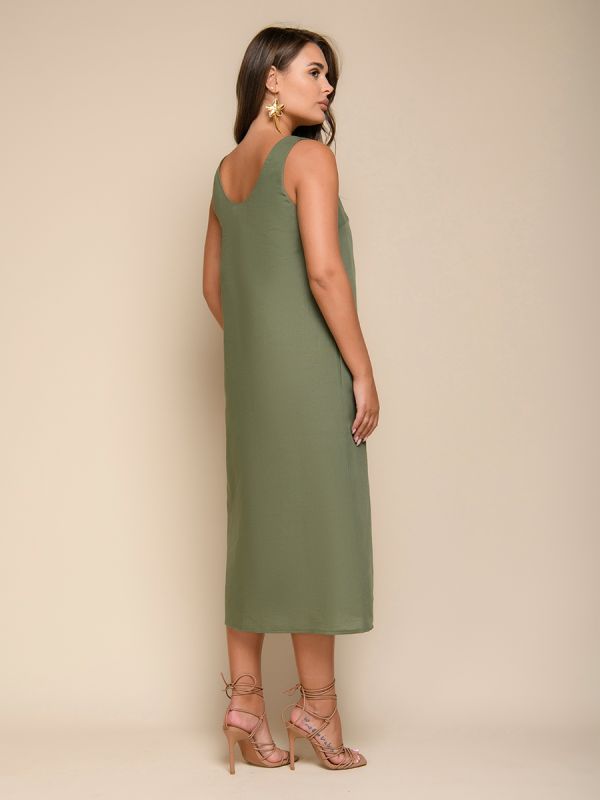 Green dress with sleeveless V-neck and slit