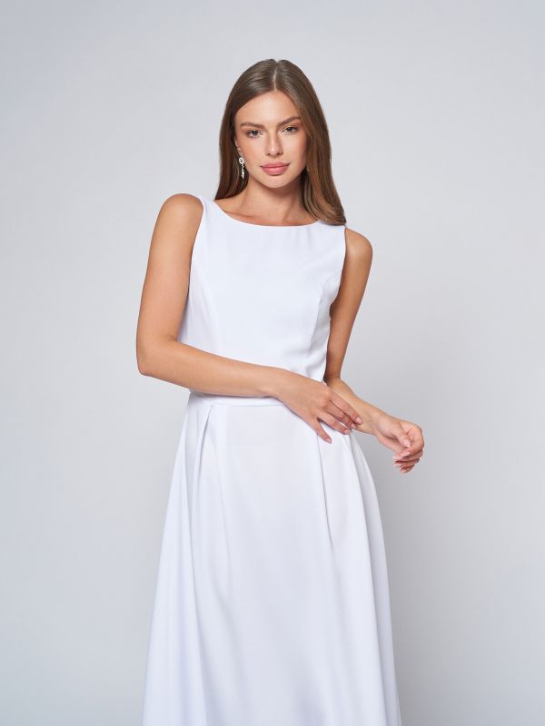 Sleeveless white maxi length dress with lace inset on back