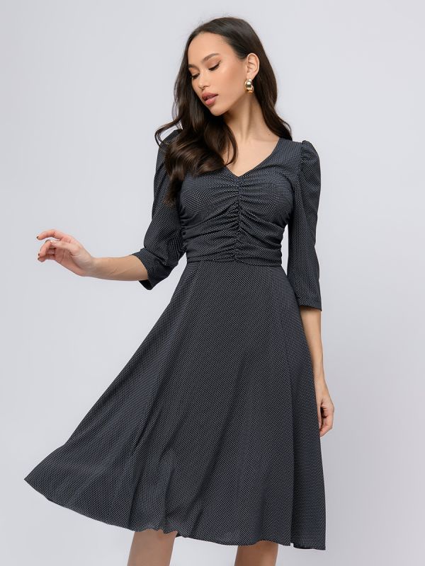 Blue polka dot midi length dress with 3/4 sleeves