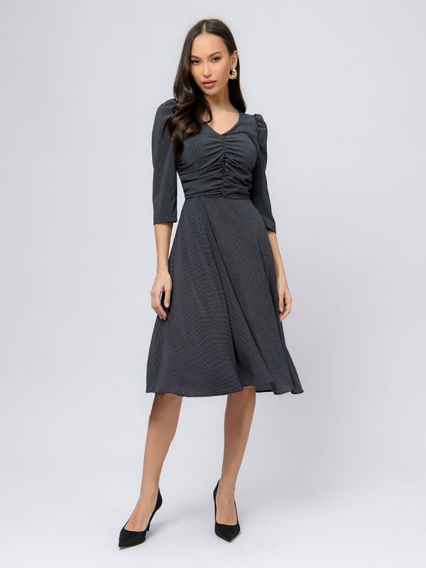 Blue polka dot midi length dress with 3/4 sleeves