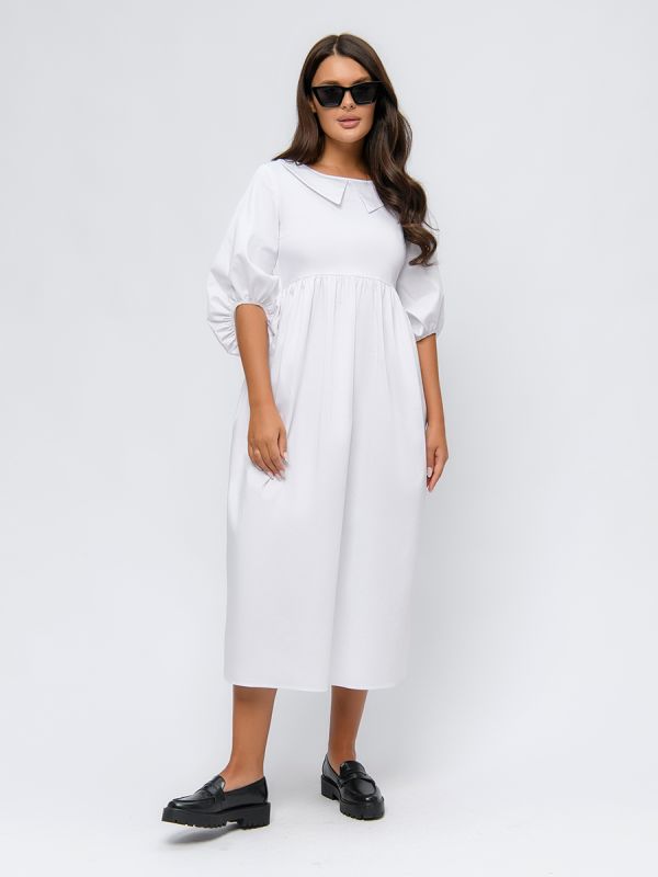 White dress with puffed sleeves and high waist