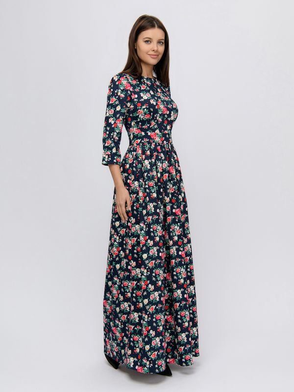 Dark blue maxi length dress with floral print and 3/4 sleeves