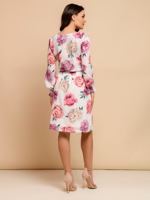 White dress with floral print and long sleeves