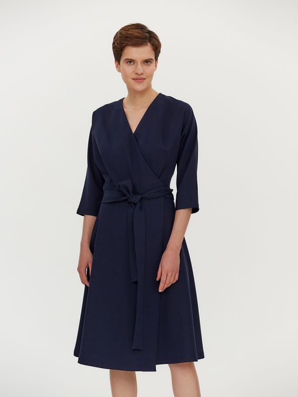 Dark blue midi length dress with flap and 3/4 sleeves