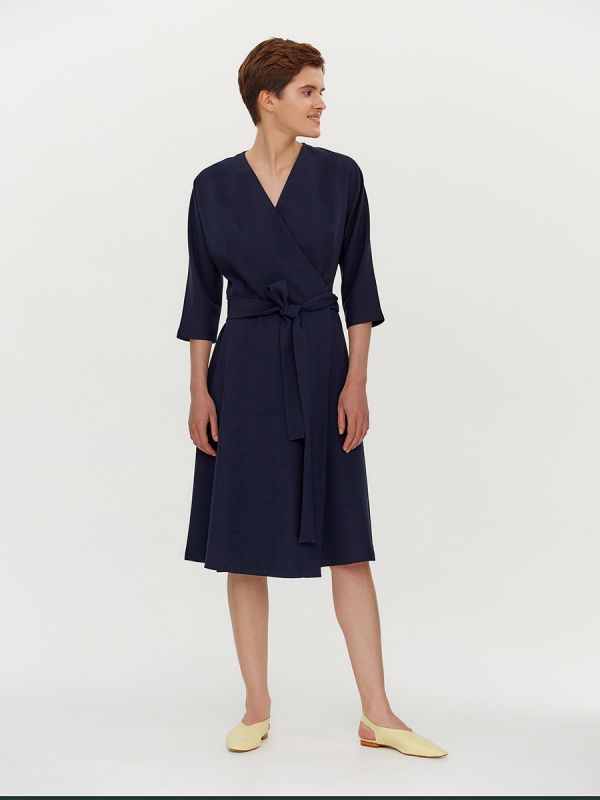 Dark blue midi length dress with flap and 3/4 sleeves