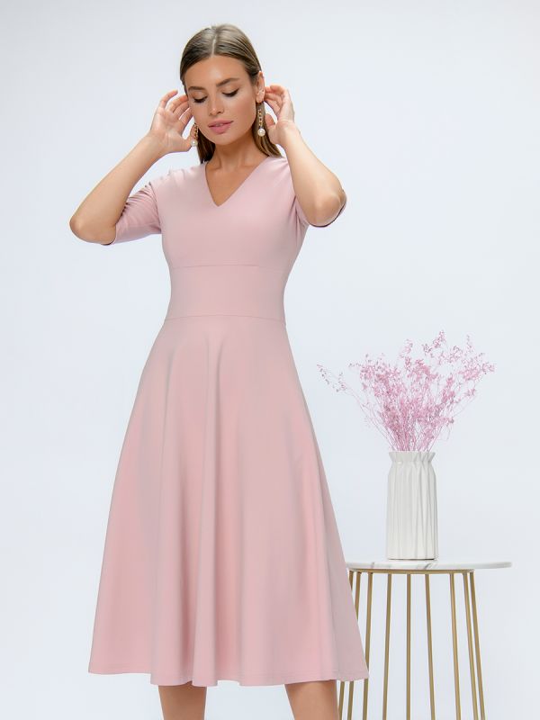 Pink midi length dress with deep neckline and 1/2 sleeves