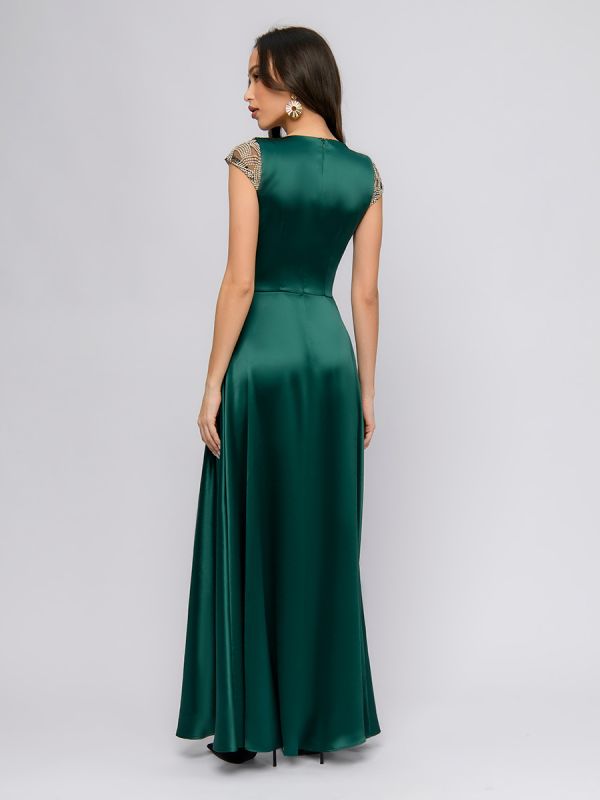 Emerald color maxi length dress with lace and slit on the skirt