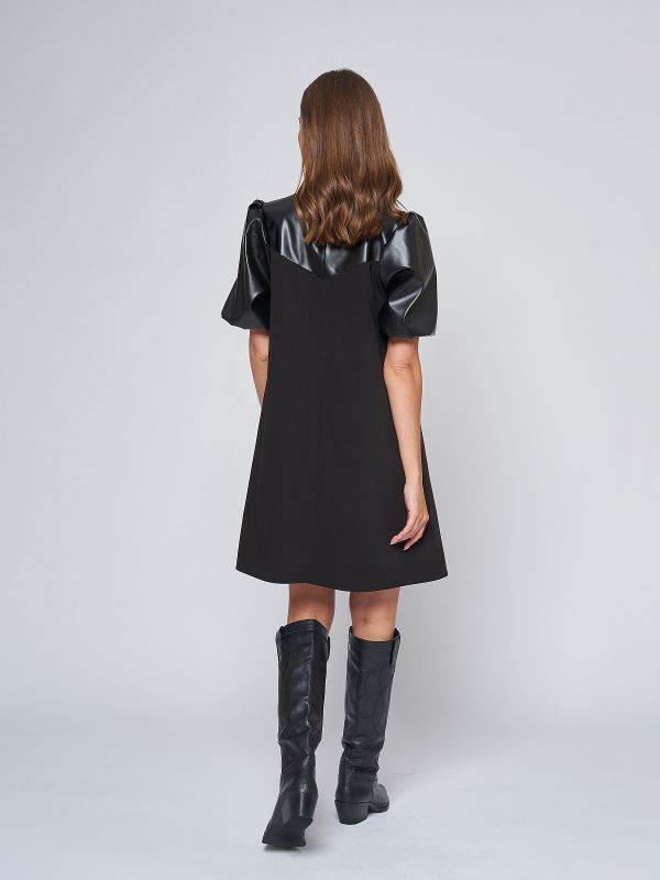 Black mini length dress with puffed sleeves and leather inset