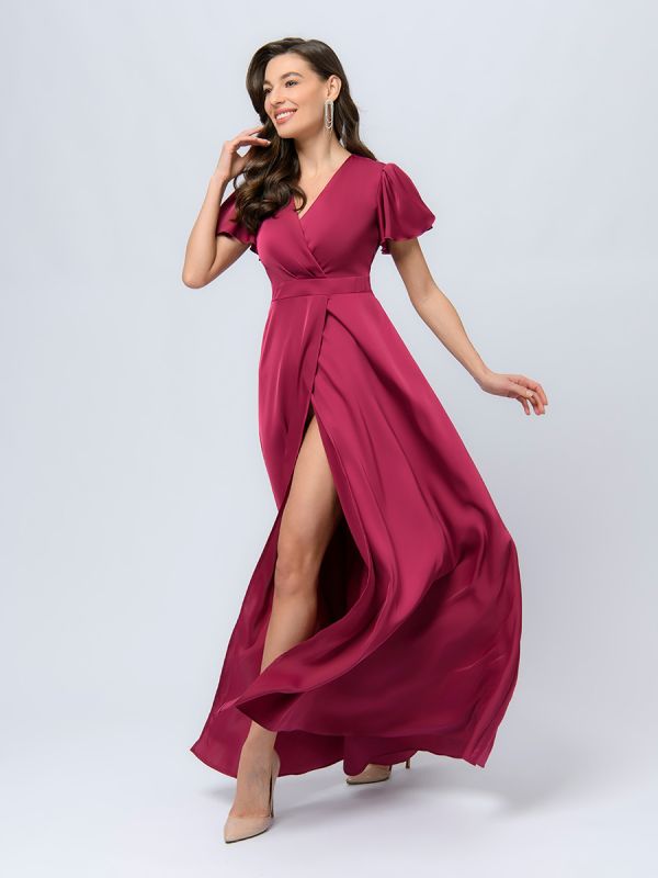 Cherry colored maxi length dress with deep neckline and shaped sleeves